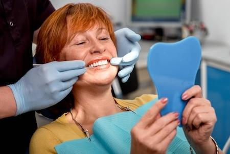woman during dental exam in edwardsville il